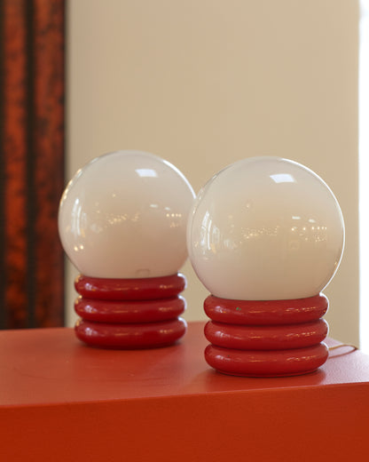 PAIR OF SMALL RED ROLL ORB LAMPS