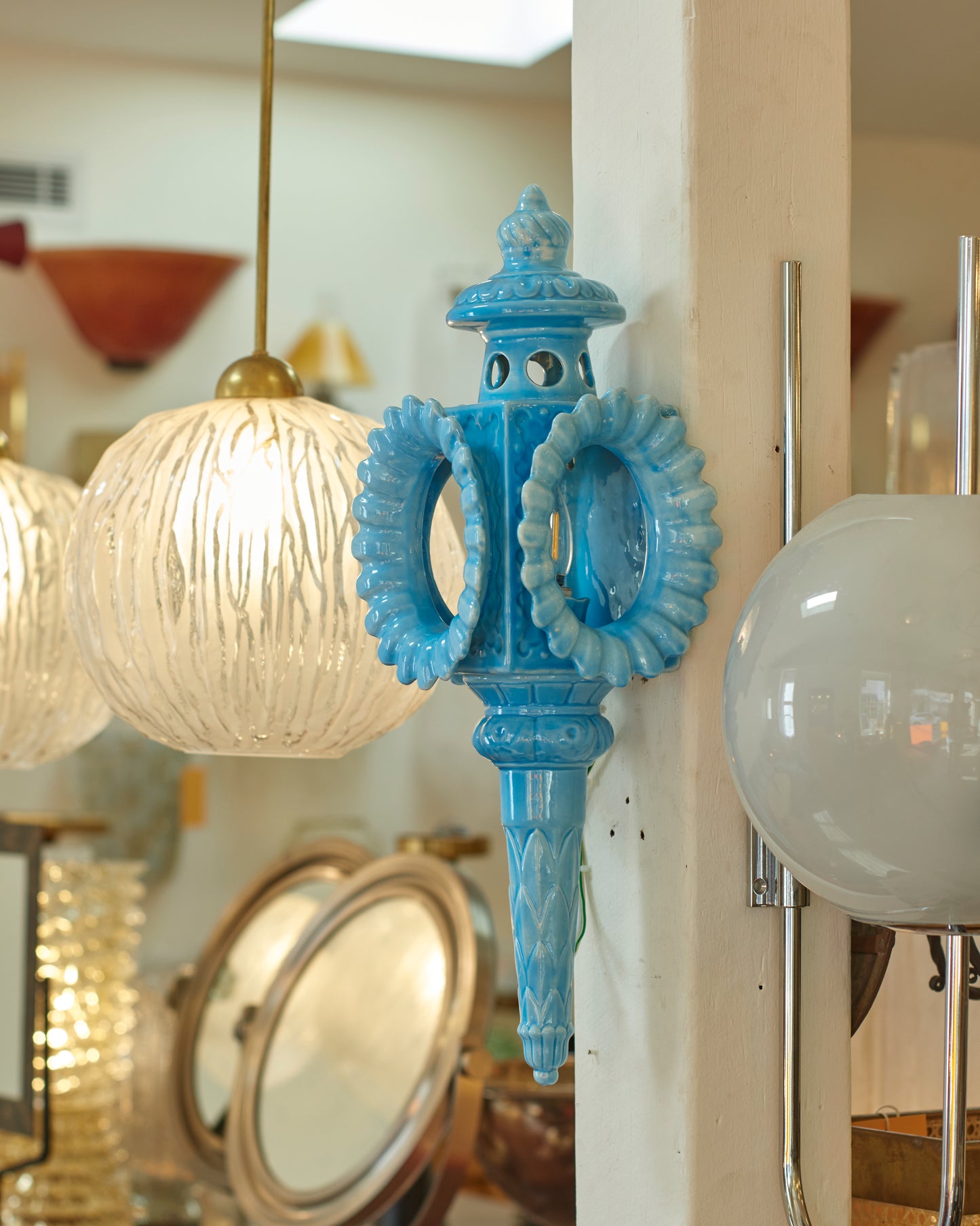 TURQUOISE CERAMIC TORCH SHELL WALL LIGHT