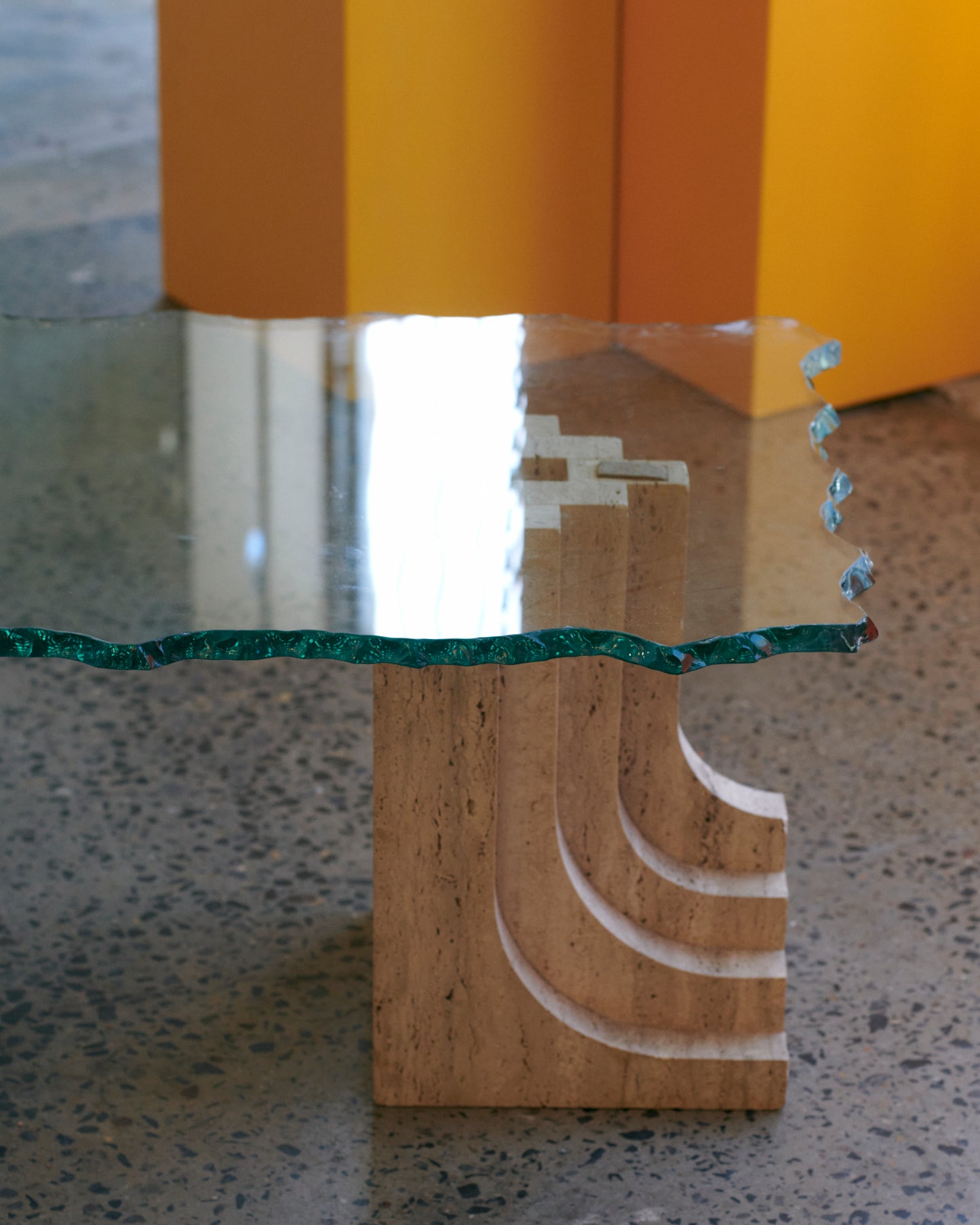 TRAVERTINE COLUMN COFFEE TABLE w. HAND CARVED GLASS TOP