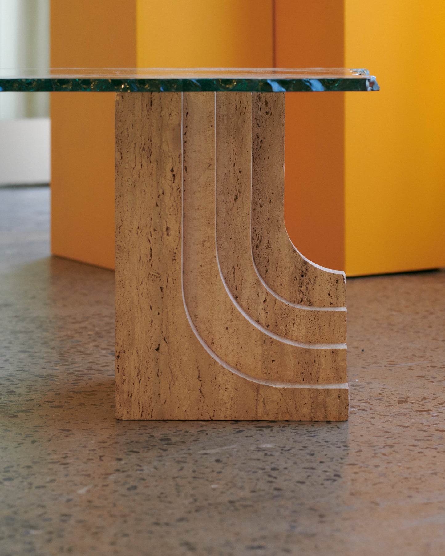 TRAVERTINE COLUMN COFFEE TABLE w. HAND CARVED GLASS TOP