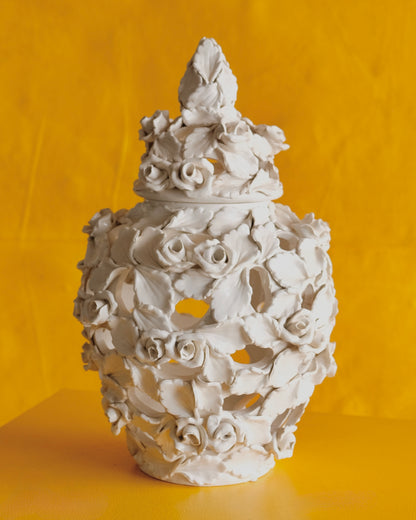 PAIR OF SIGNED CERAMIC FLORAL VESSELS