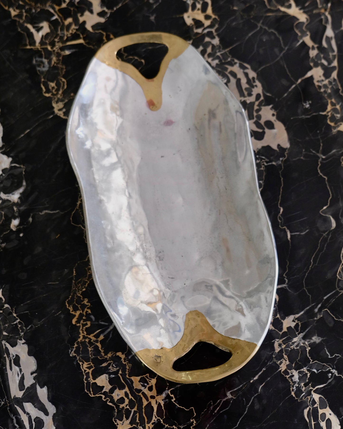 PAIR OF ABSTRACT CAST ALUMINIUM TRAYS w. BRASS HANDLES