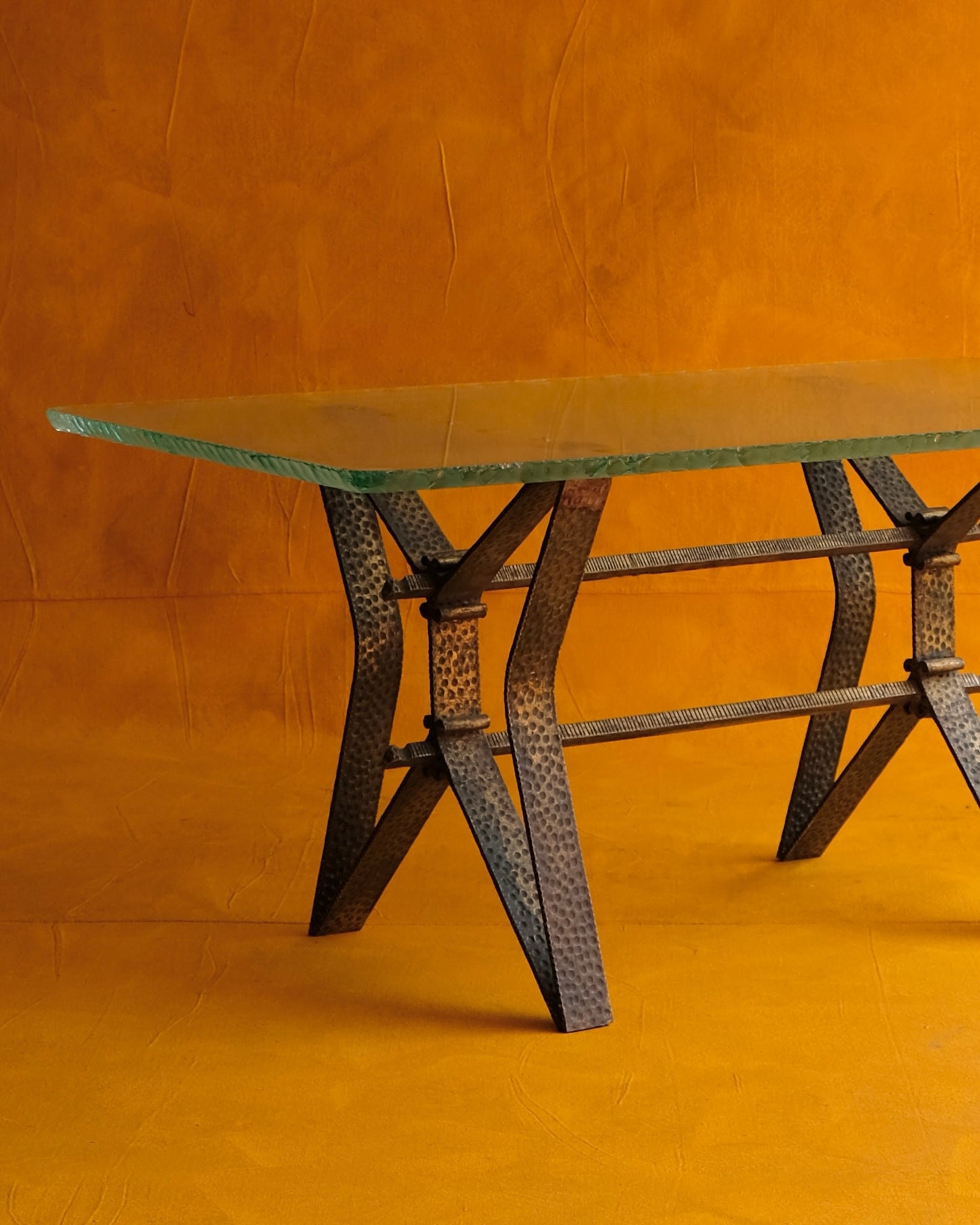 BRASS BASE COFFEE TABLE w. CARVED EDGED GLASS
