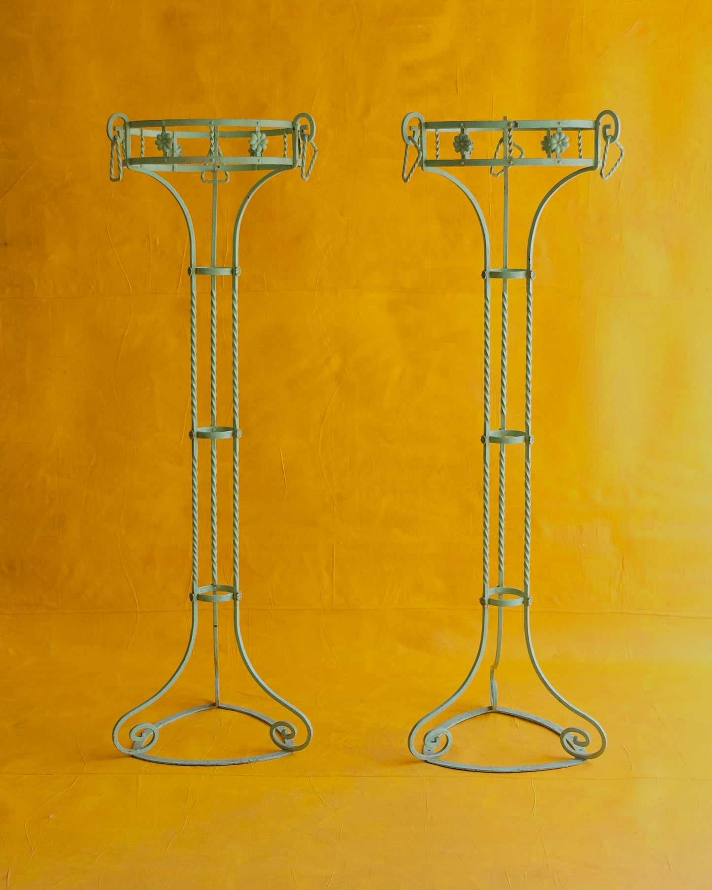 PAIR OF WROUGHT IRON GREEN PLANT STANDS
