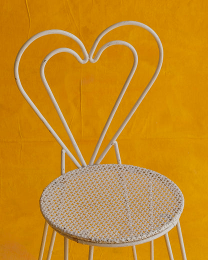 PAIR OF WHITE METAL HEART CHAIRS