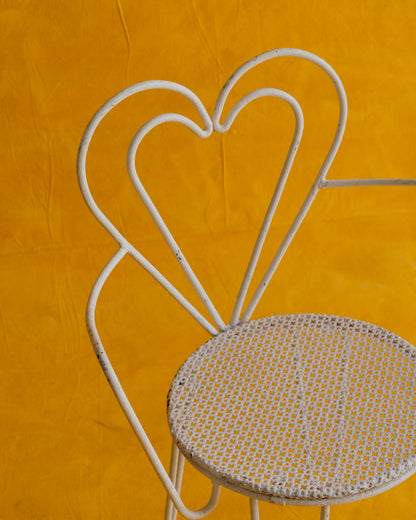 PAIR OF WHITE METAL HEART ARMCHAIRS