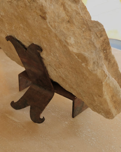 CARVED STONE FRAGMENT w. CURLED WROUGHT IRON STAND