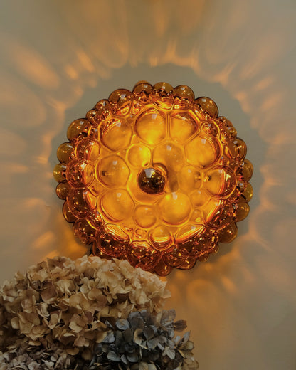 PAIR OF AMBER BUBBLE GLASS SCONCES