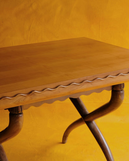 HAND CARVED CROSS LEG TABLE w. WAVE EDGE DETAIL