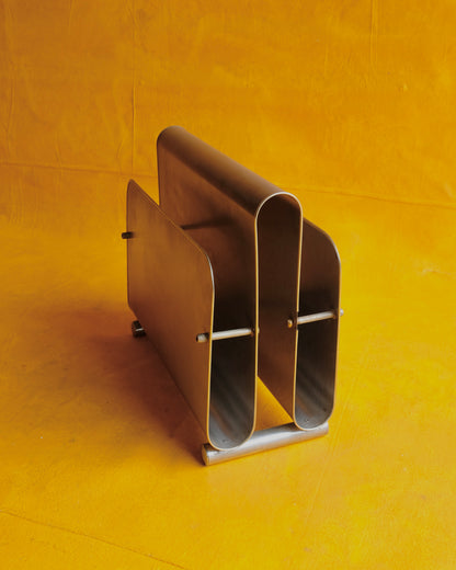 CURVED STEEL MAGAZINE RACK
