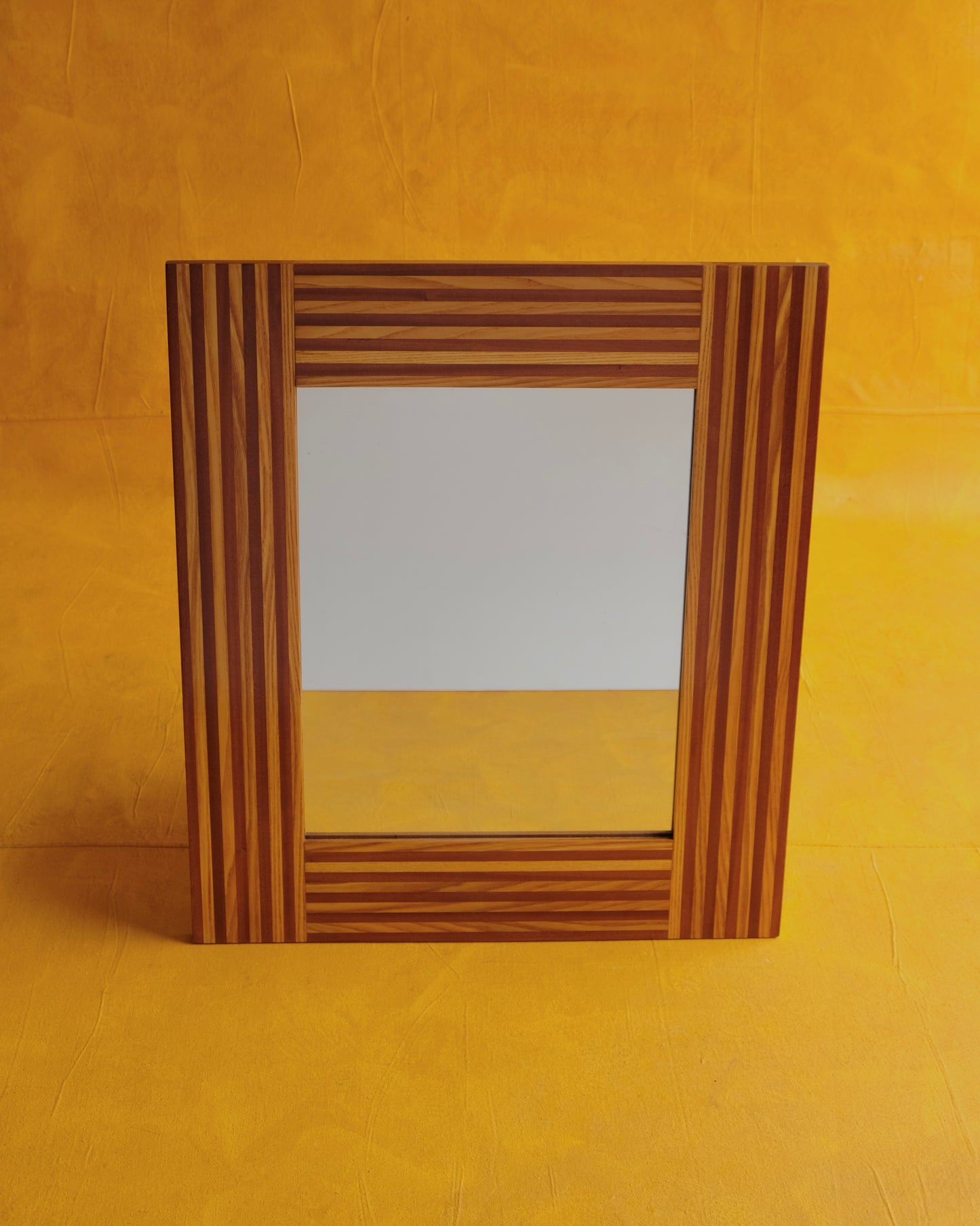 PAIR OF LINED TIMBER PATTERN MIRRORS