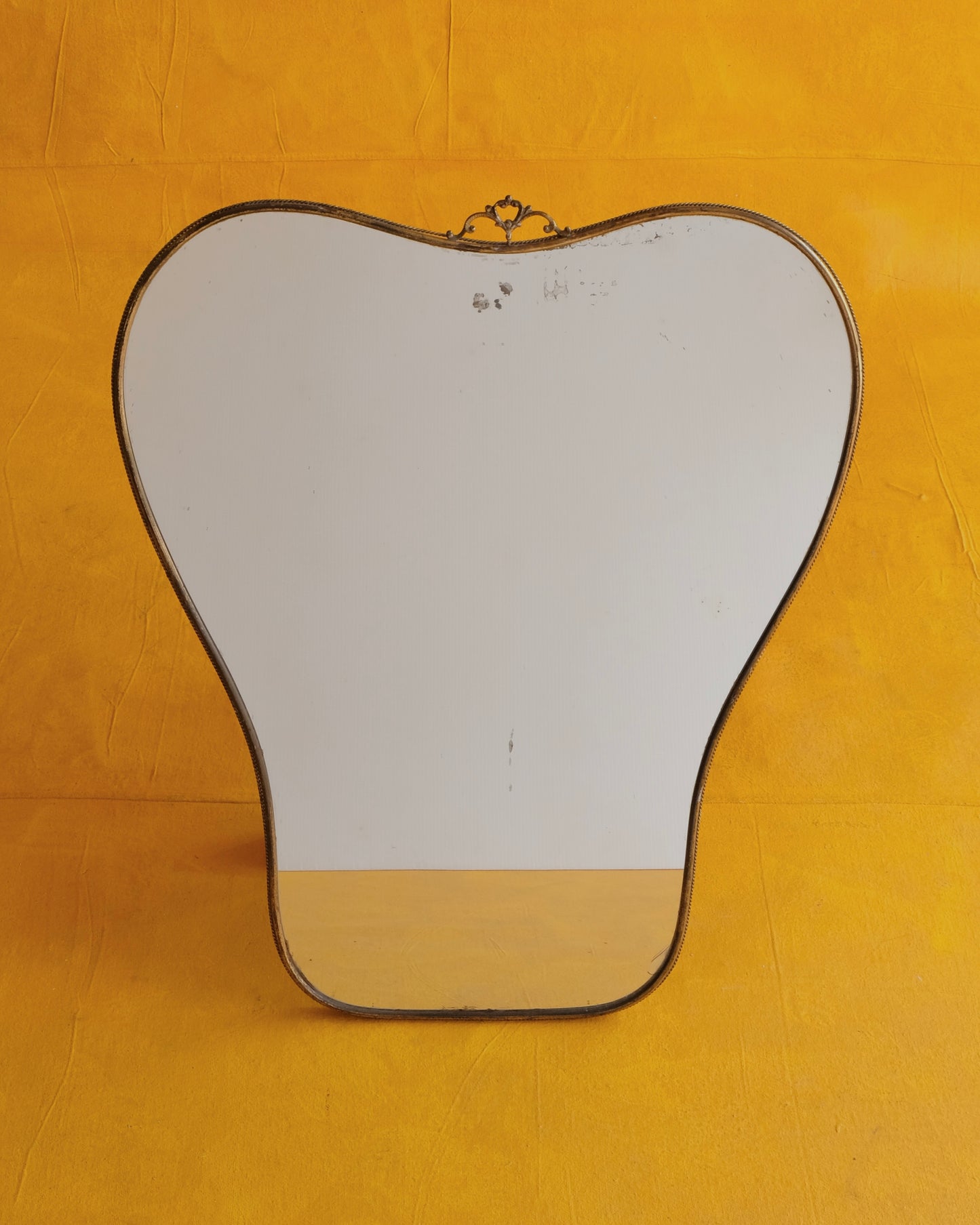 TAPERED CURVED BRASS MIRROR