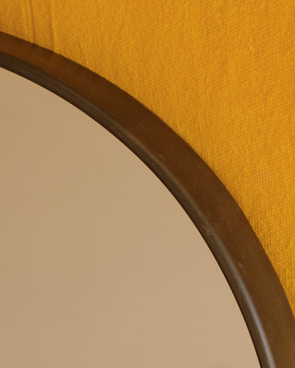 MODERNIST CURVED BRASS MIRROR