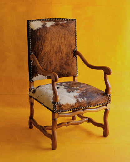 PAIR OF SPANISH WALNUT & COW HIDE ARMCHAIRS