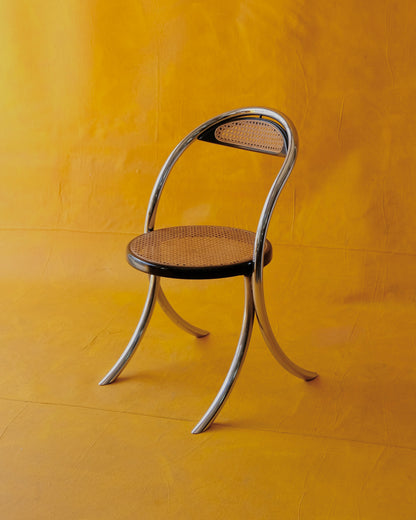 SET OF EIGHT CURVED CHROME & RATTAN CHAIRS