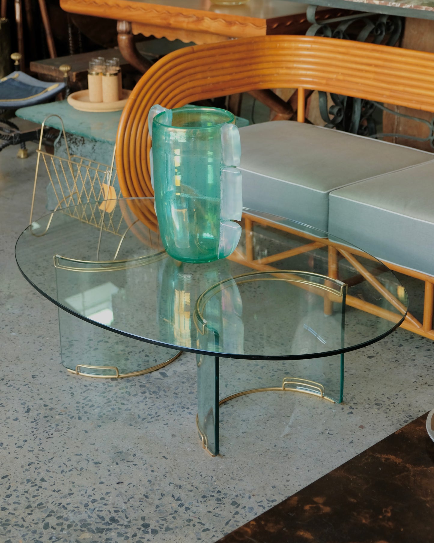 CURVED GLASS ADAM COFFEE TABLE w. BRASS DETAIL