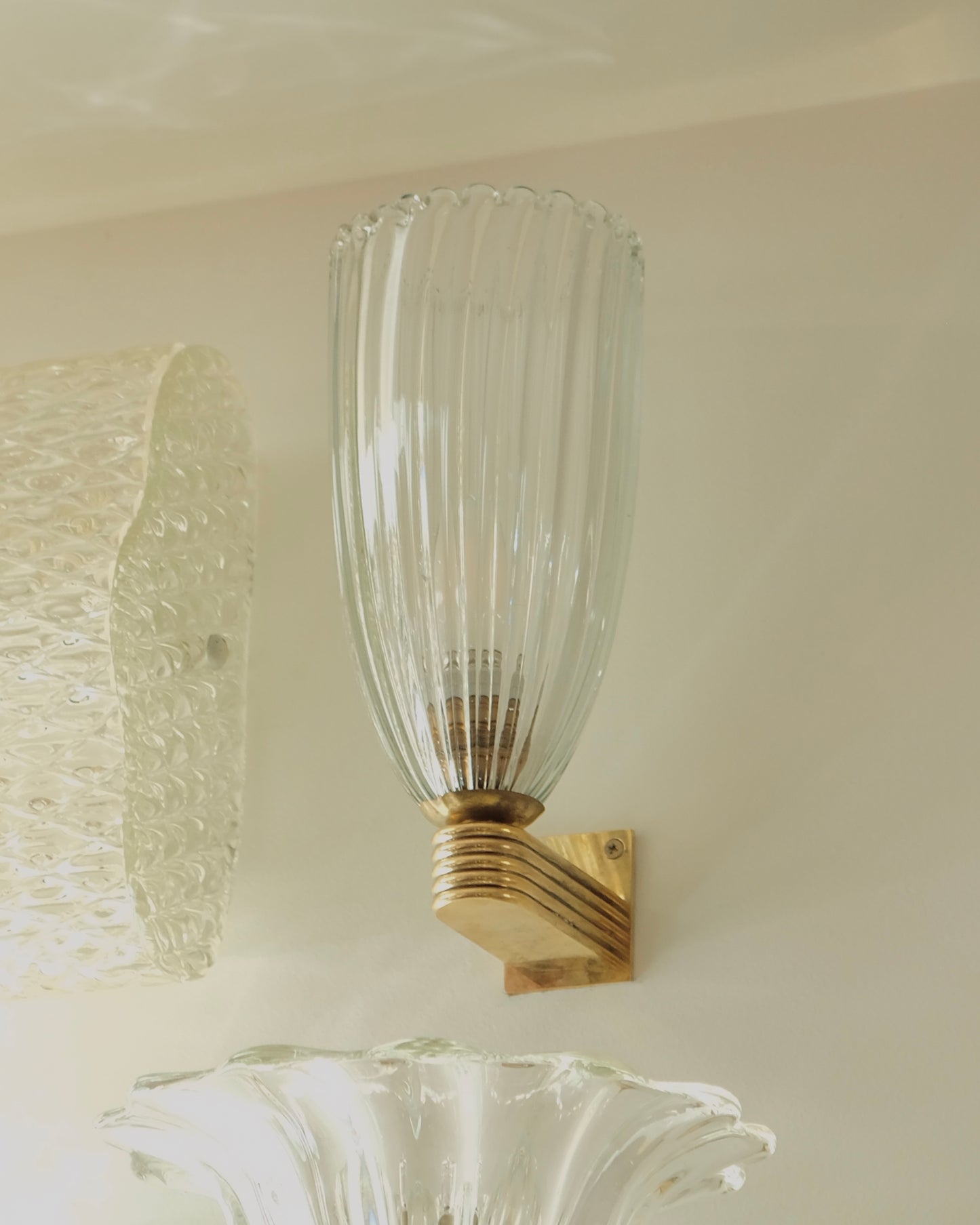 PAIR OF NARROW FLUTED MURANO GLASS WALL SCONCES