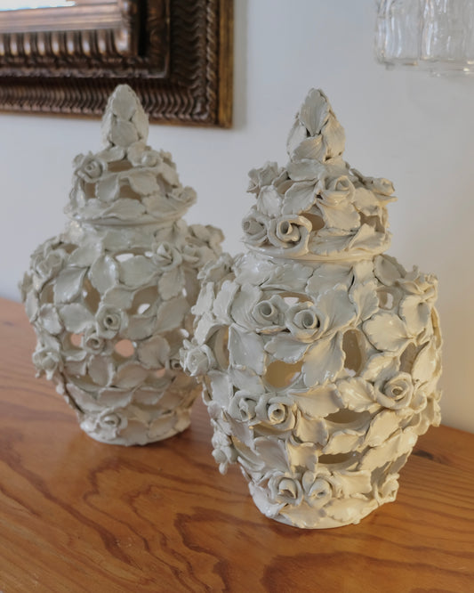 PAIR OF SIGNED CERAMIC FLORAL VESSELS
