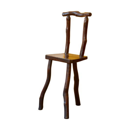 HAND CARVED EBONIZED PRIMITIVE TALL CHAIR