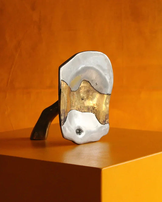 CAST ALUMINIUM & BRASS CENTERED SCULPTURE