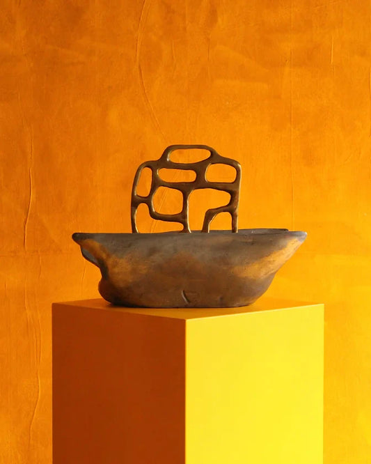 CAST ALUMINIUM & BRASS SCULPTURAL MAGAZINE RACK