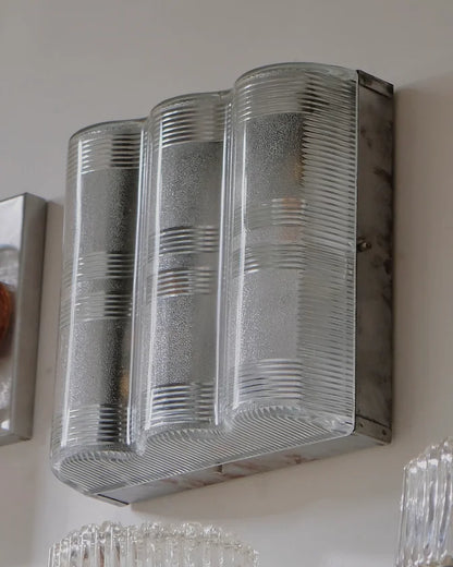 TRIO OF BRUSH ALUMINIUM LINED GLASS SCONCES