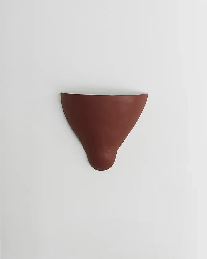 SCULPTURAL PAINTED STEEL SCONCES