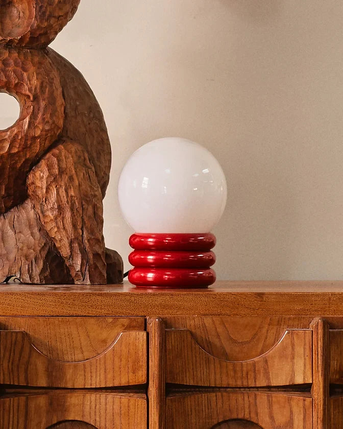 PAIR OF SMALL RED ROLL ORB LAMPS