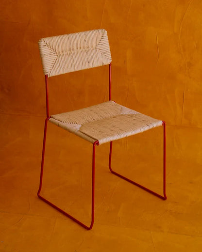 SET OF FOURTEEN STACKABLE RED DINING CHAIRS