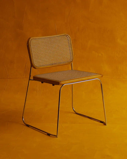 PAIR OF STACKABLE RATTAN DINING CHAIRS