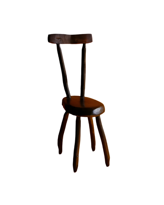 HAND CARVED EBONIZED PRIMITIVE CHAIR