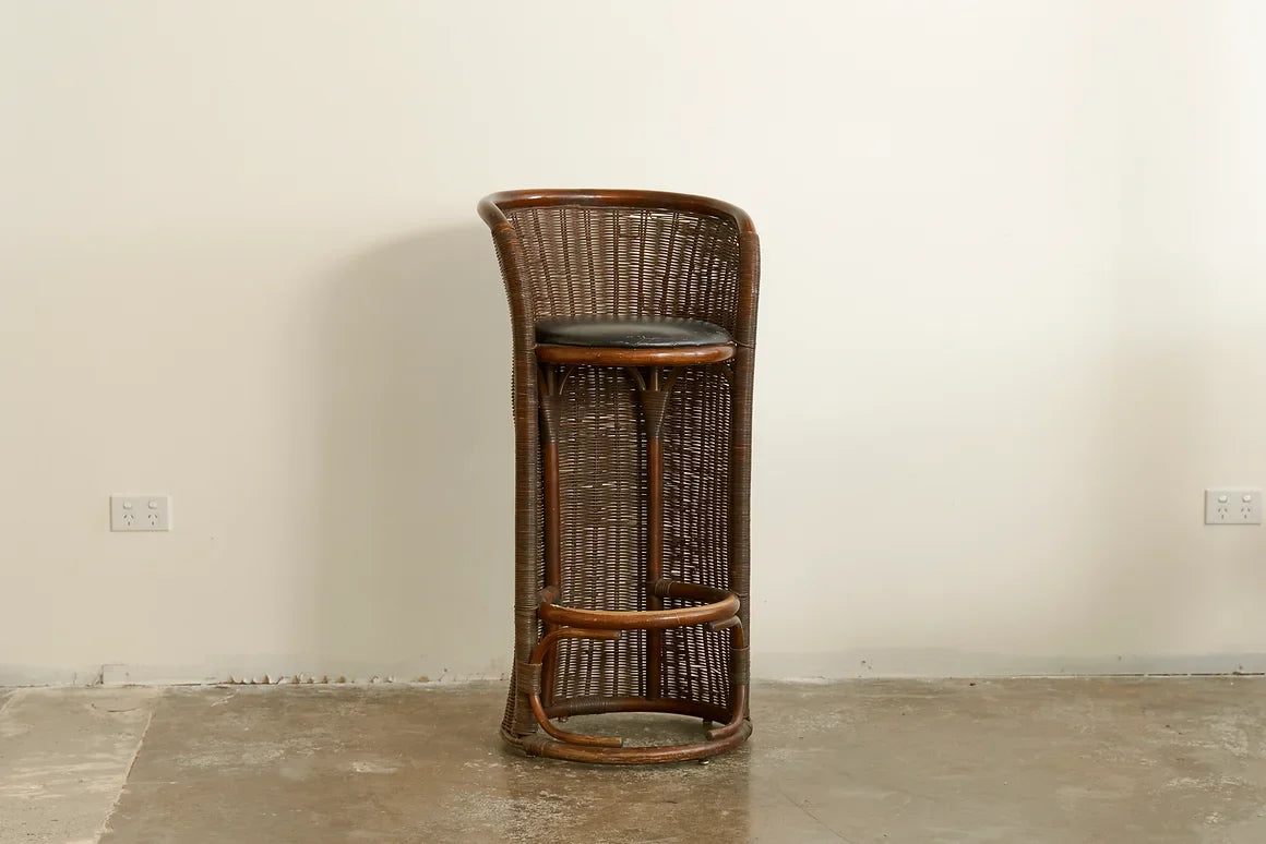 TRIO OF MID CENTURY RATTAN CYLINDRICAL BAR STOOLS