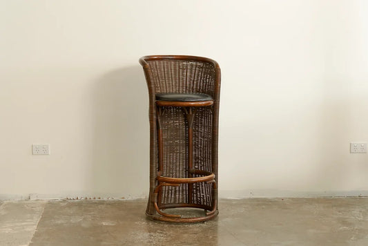 TRIO OF MID CENTURY RATTAN CYLINDRICAL BAR STOOLS