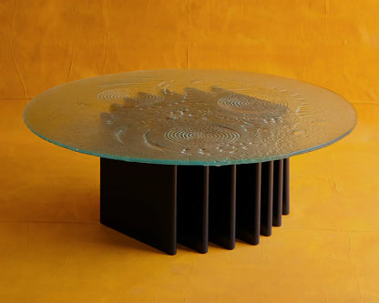 SCULPTURAL GLASS COFFEE TABLE w. NAVY COLUMN BASE