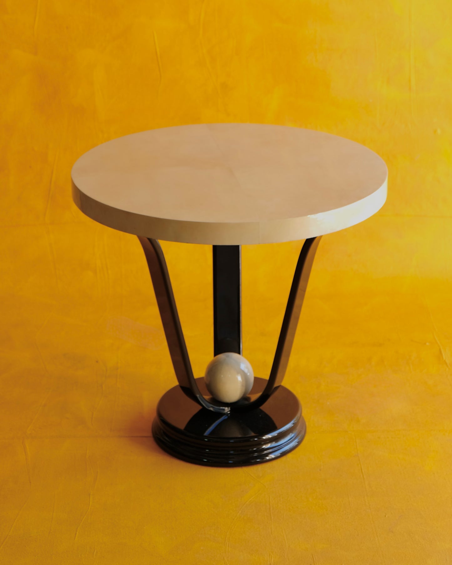 TRIO OF ART DECO PARCHMENT SIDE TABLES w. EBONIZED BASE
