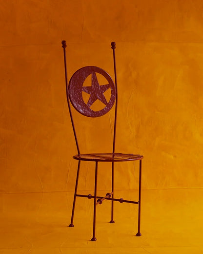 PAIR OF RED WROUGHT IRON STAR CHAIRS