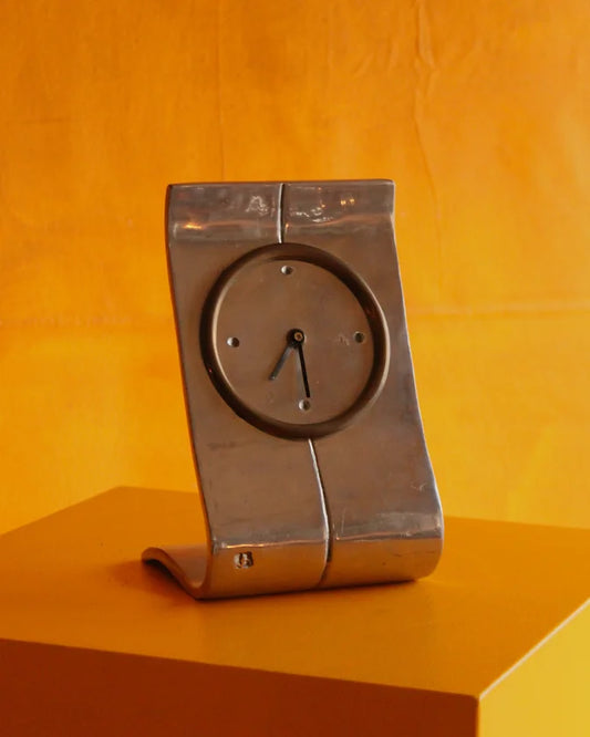 CAST ALUMINIUM & BRASS CURVED CLOCK