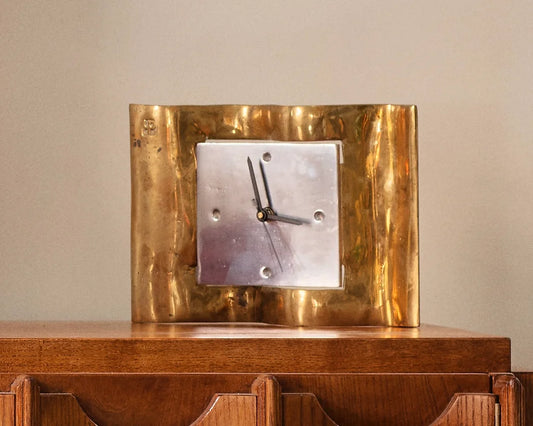 CAST ALUMINIUM & BRASS WAVY SCULPTURAL CLOCK